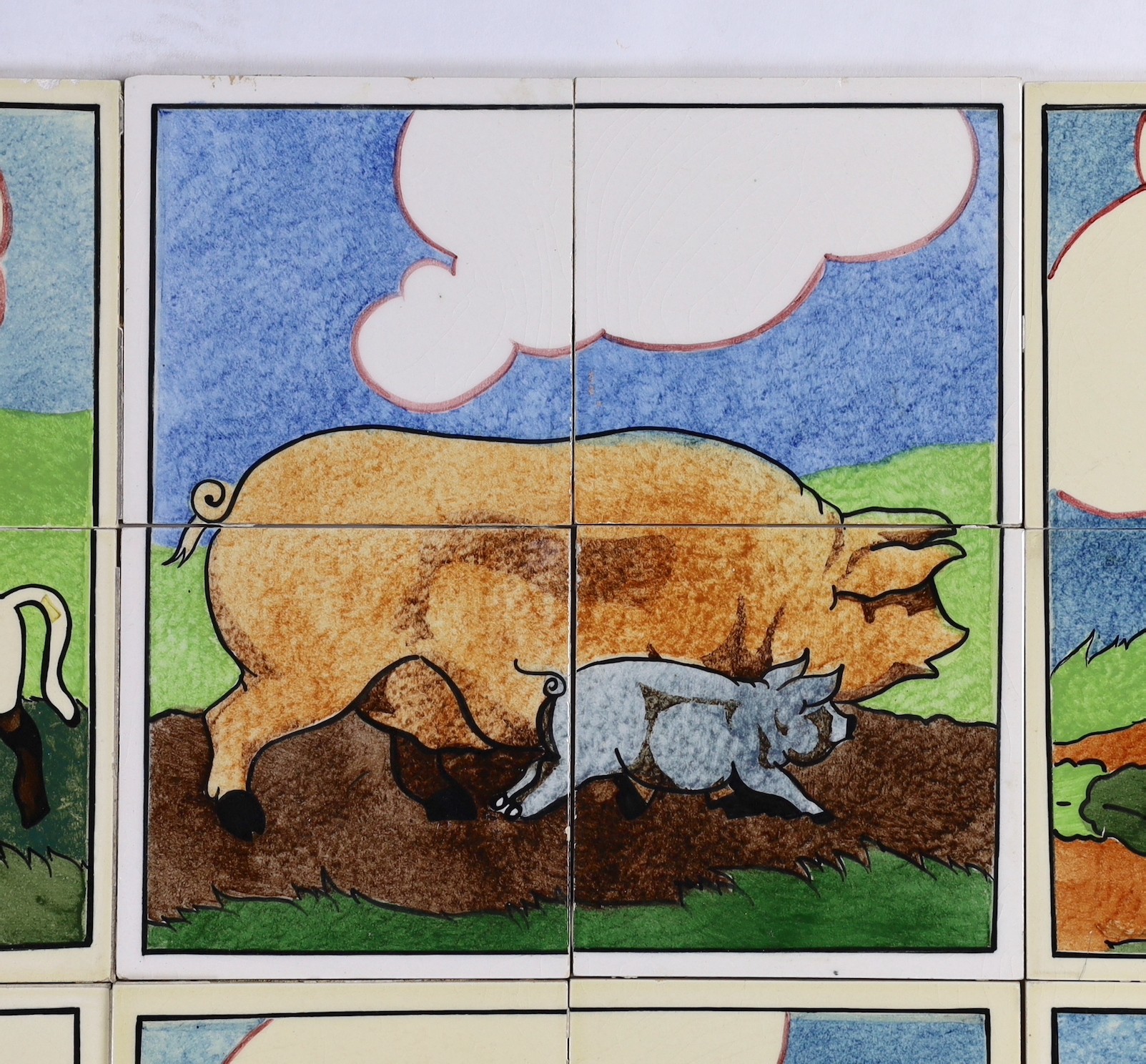 E.E. Strickland for Carter & Co, Poole pottery, six sets of four tile panels of animals and farm scenes, each tile 15.2cm (6in.) square and each set of four tiles 61cm square, minor faults